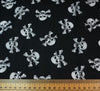 Polycotton Fabric - Skull & Crossbones (White on Black)