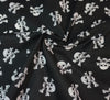 Polycotton Fabric - Skull & Crossbones (White on Black)