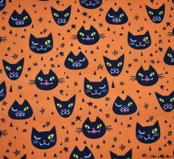 Polycotton Fabric - Creepy Cat Face Orange