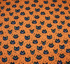 Polycotton Fabric - Creepy Cat Face Orange