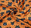 Polycotton Fabric - Creepy Cat Face Orange