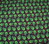 Polycotton Fabric - Scary Skulls Green
