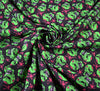 Polycotton Fabric - Scary Skulls Green