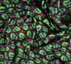 Polycotton Fabric - Scary Skulls Green