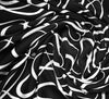 Swirly Swiggle Viscose Ponte Roma Fabric - Black