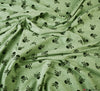 Cotton Jersey Fabric - Marl Skulls & Crossbones - Sage Green