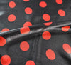 Red Spot on Black Silky Satin Fabric
